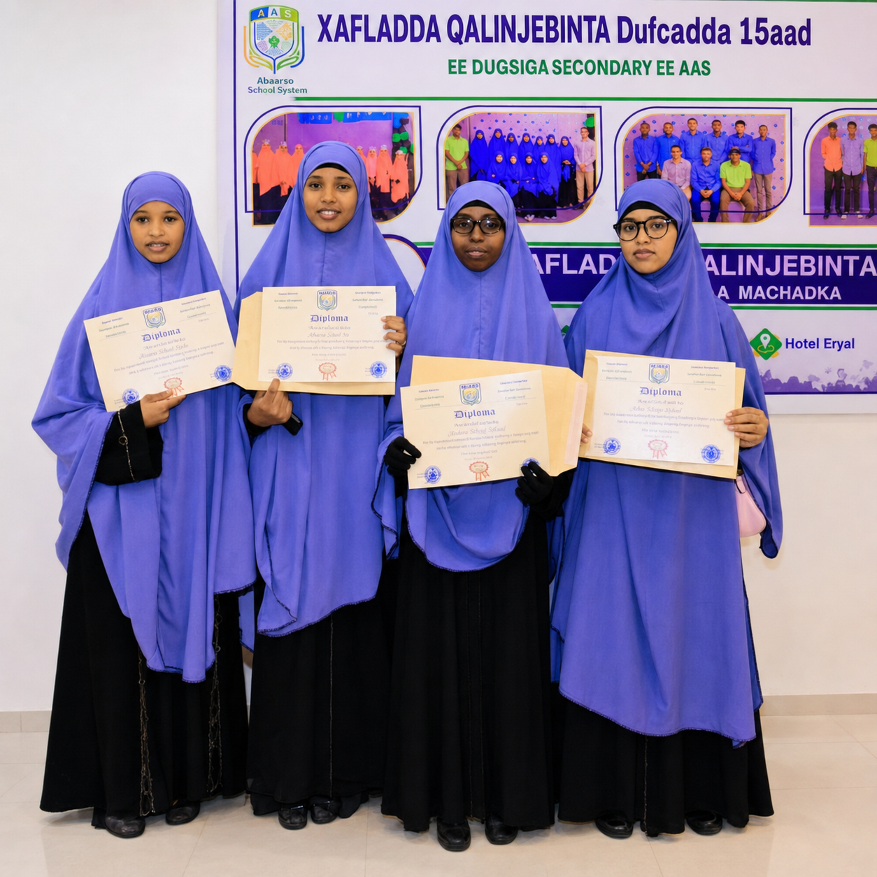 Female SIHBA graduates holding their certificates