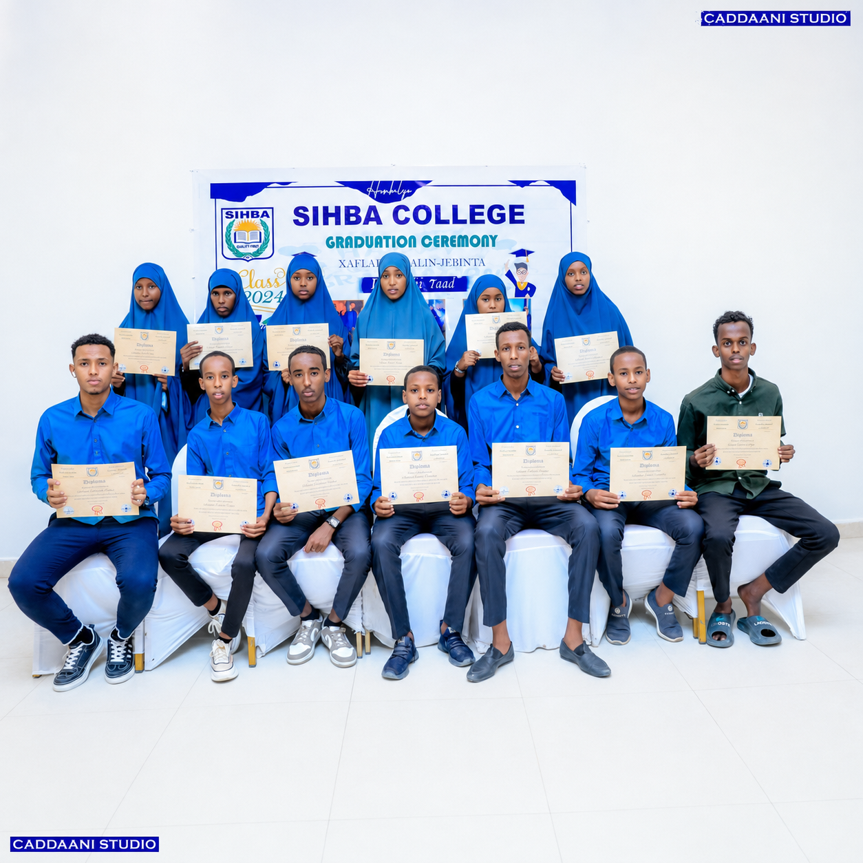 SIHBA College graduates holding certificates in a group photo