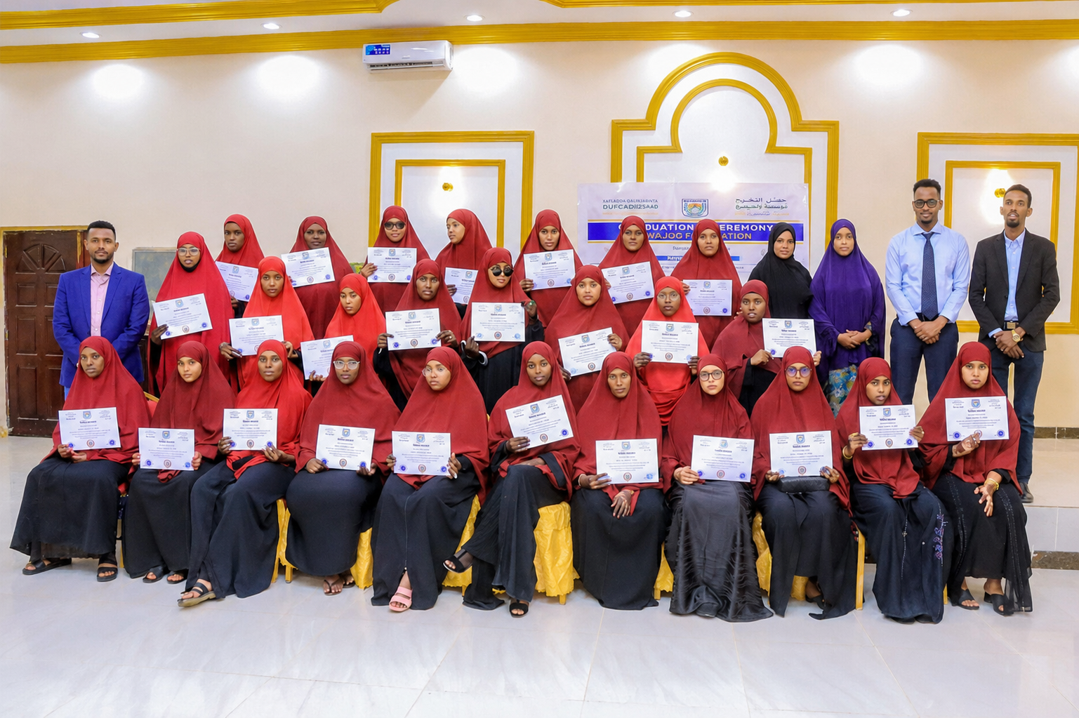 SIHBA graduation group holding their certificates