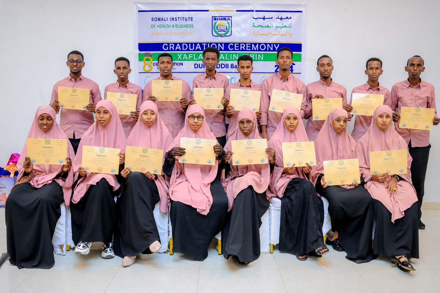 SIHBA students and staff at a graduation ceremony